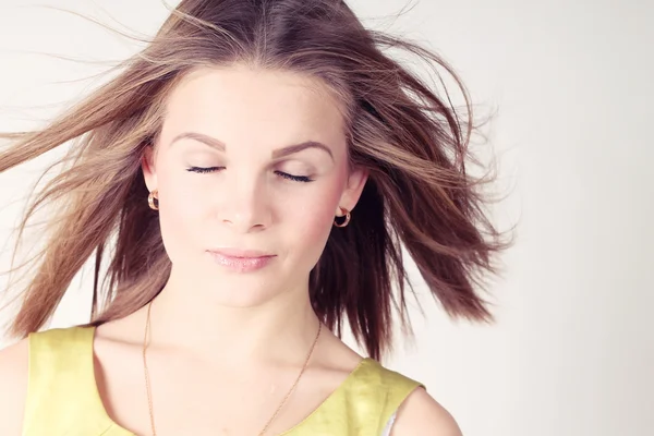 Portrait of beautiful girl with closing eyes — Stock Photo, Image