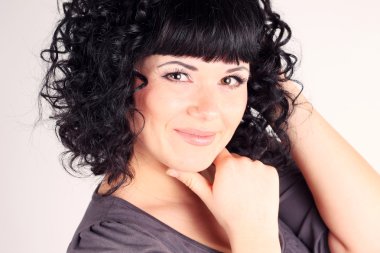 Beautiful curly brunette