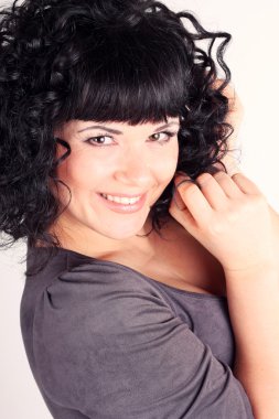 Beautiful curly brunette