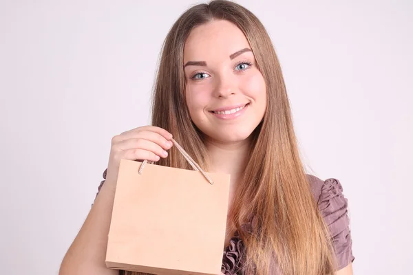 Menina bonita com sacos de compras — Fotografia de Stock