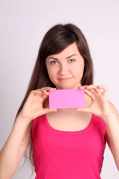Girl with a card — Stock Photo, Image