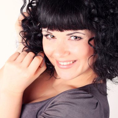 Сurly brunette woman