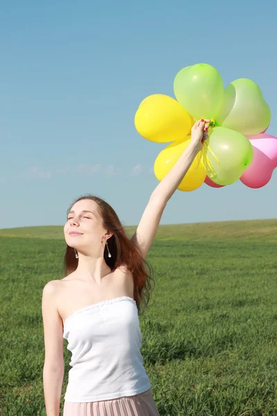 Happy glamor girl with balloons — Stock Fotó