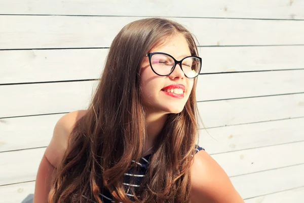 Young girl Teenager with a wooden fence — Stock Photo, Image