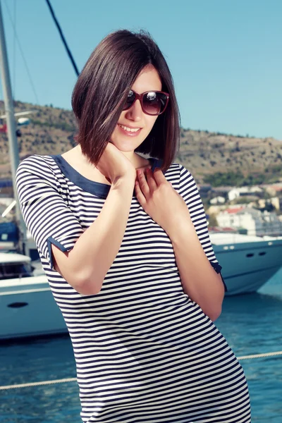 Beautiful woman on a yacht Stock Photo