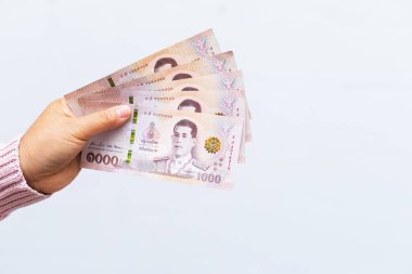 Banknotlar 5 bin baht Thai eder.