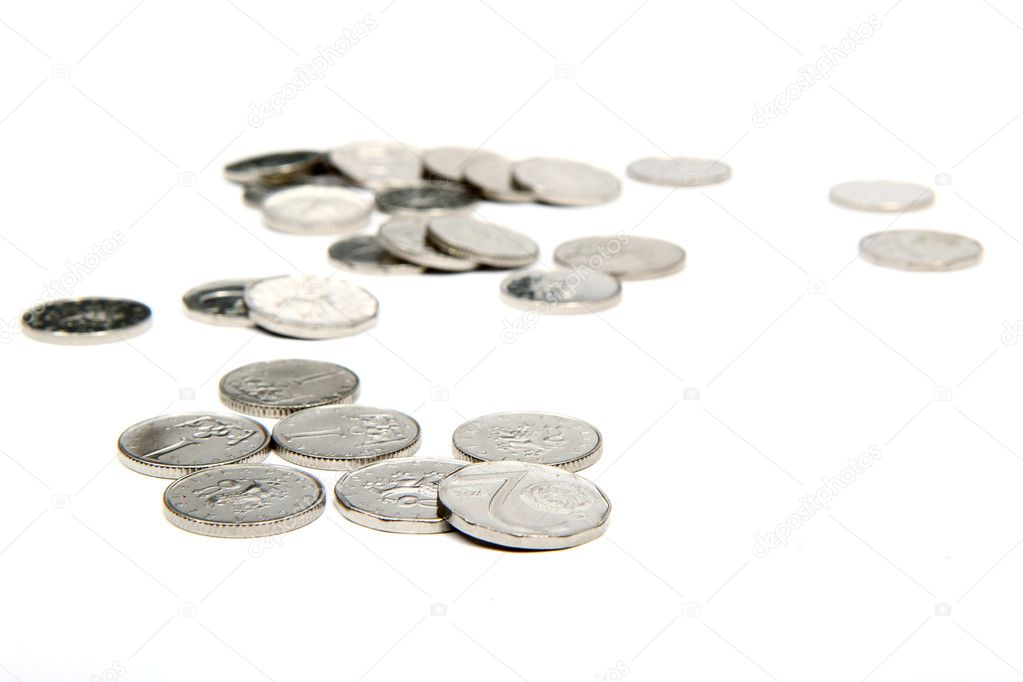 Group of silver coins on white background