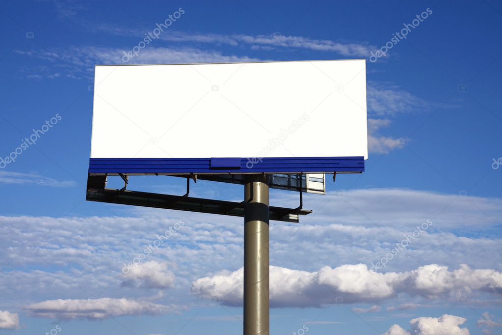 White blackboard under cloudy sky