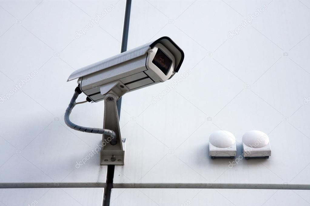 white cctv camera