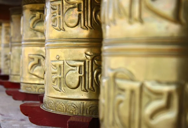 Holy golden praying wheels — Stock Photo, Image