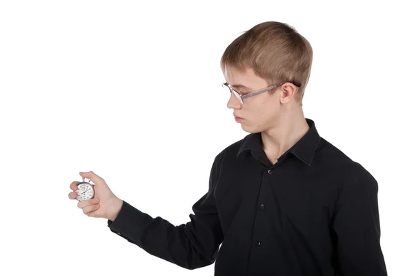 Ung man med ett tidtagarur i handen på vit bakgrund — Stockfoto