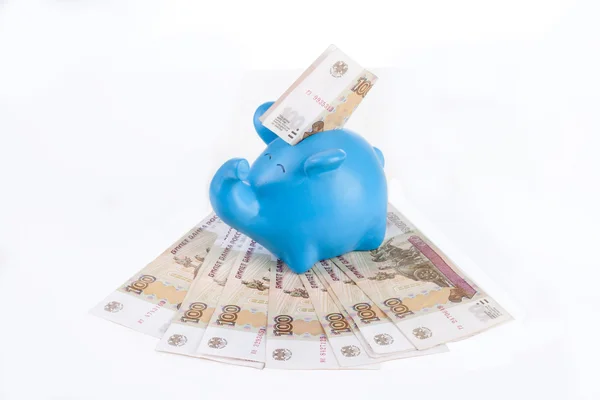 Piggy bank with bills hundred rubles — Stock Photo, Image
