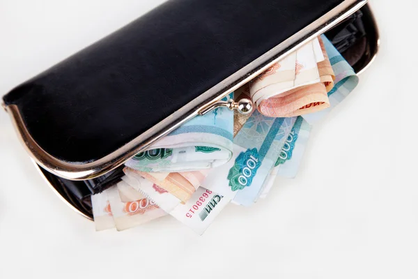 bir tomar para siyah çanta içinde