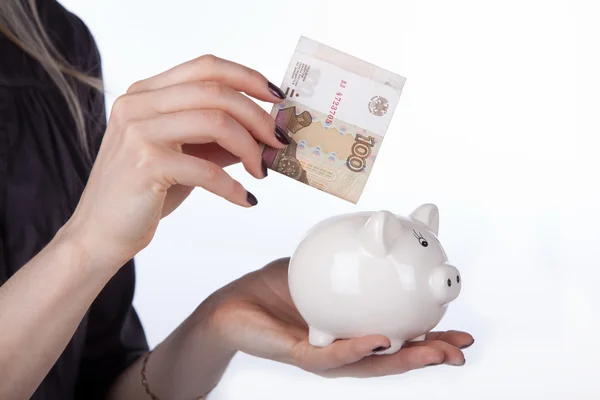 Piggy bank with bills — Stock Photo, Image