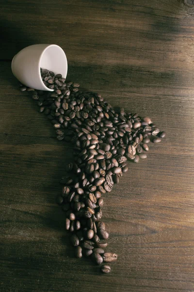 Kaffebönor som anges i form av Sydamerika mot en — Stockfoto