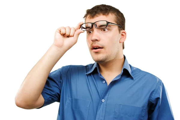 Surprised young man on a white background — Stock Photo, Image