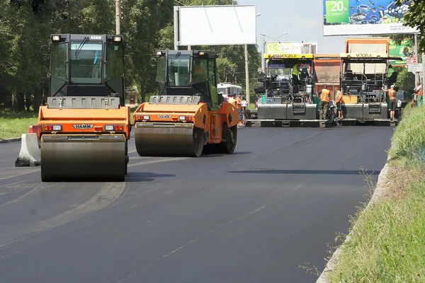 Asphalt cars on the road — Stock Photo, Image