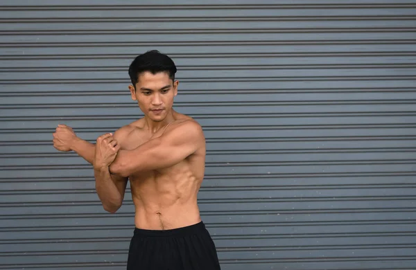Hombre Joven Con Músculo Forma Firme Estirando Cuerpo Antes Del —  Fotos de Stock