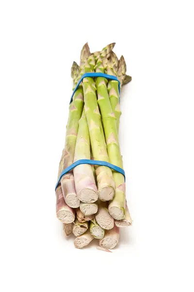 Asparagus terisolasi pada latar belakang studio putih . — Stok Foto