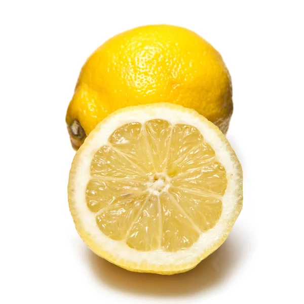 Lemons and Limes isolated on a white studio background. — Stock Photo, Image