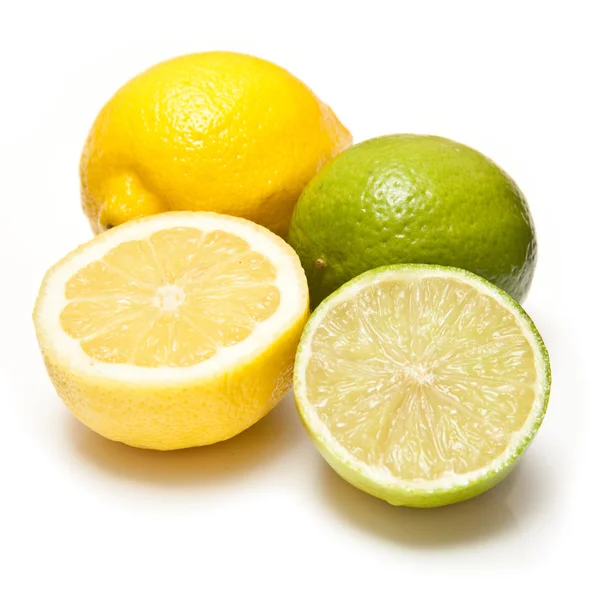 Lemons and Limes isolated on a white studio background. — Stock Photo, Image