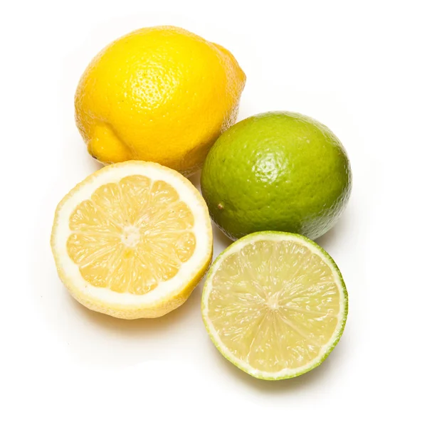 Lemons and Limes isolated on a white studio background. — Stock Photo, Image