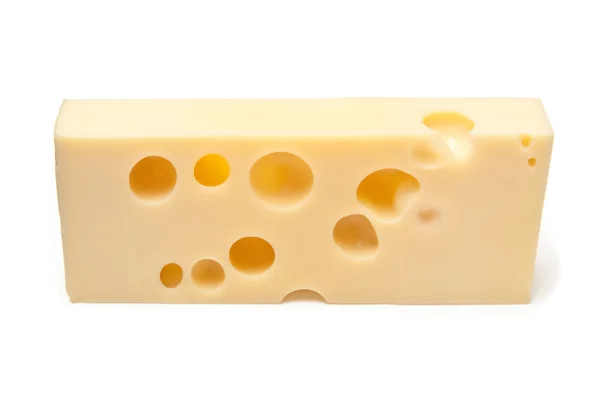 Emmental Swiss cheese isolated on a white studio background. Royalty Free Stock Images