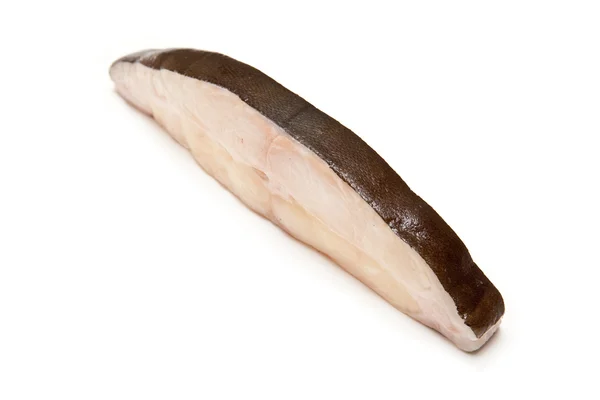 Halibut fish steak isolated on a white studio background. — Stock Photo, Image