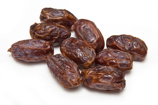 Medjool dates isolated on a white studio background. — Stock Photo, Image