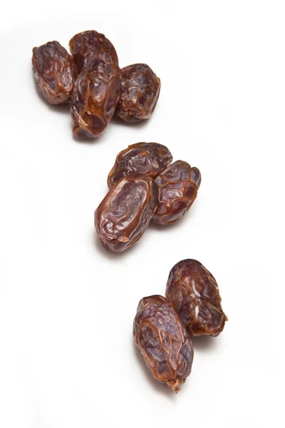 Medjool dates isolated on a white studio background. — Stock Photo, Image