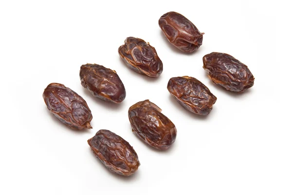 Medjool dates isolated on a white studio background. — Stock Photo, Image