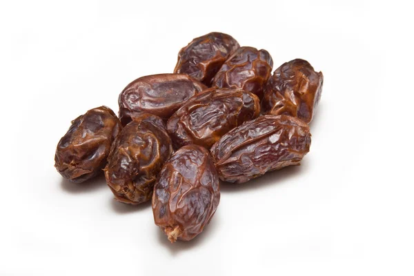 Medjool dates isolated on a white studio background. Stock Image