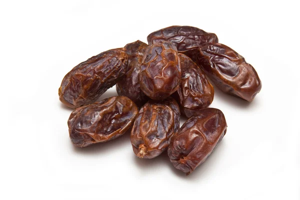 Medjool dates isolated on a white studio background. Royalty Free Stock Photos