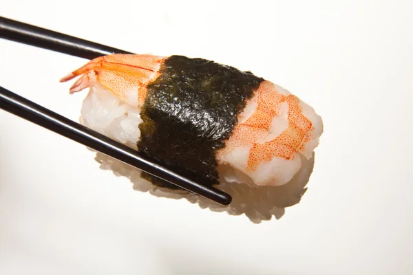 Bedrijf sushi met stokjes — Stockfoto