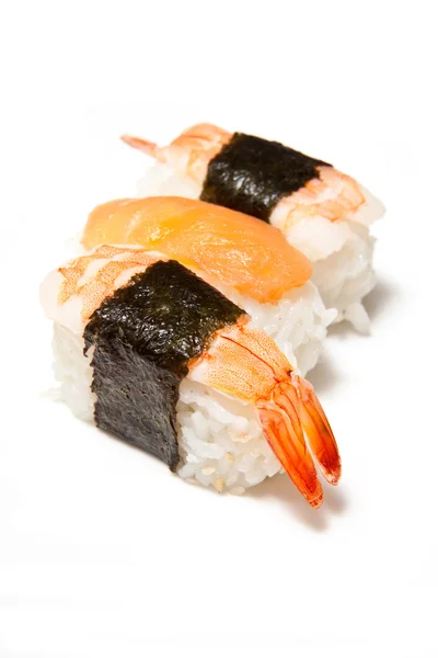 Tenue de sushis avec baguettes — Photo