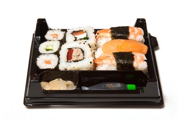 Bedrijf sushi met stokjes — Stockfoto