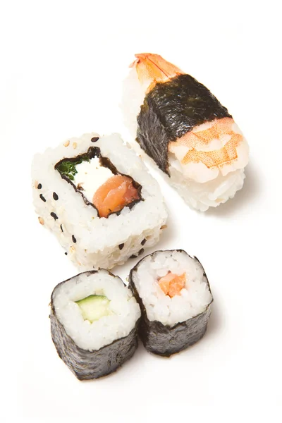 Drží sushi hůlkami — Stock fotografie