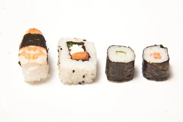 Gospodarstwa sushi z pałeczkami — Zdjęcie stockowe
