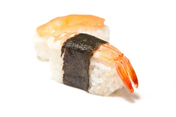 Sushi mit Essstäbchen — Stockfoto