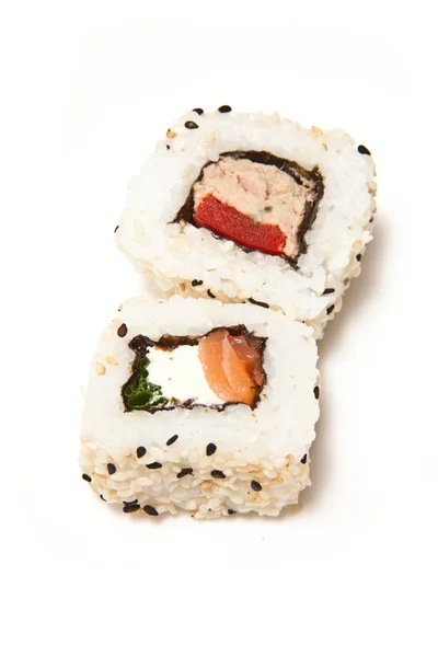 Sushi mit Essstäbchen — Stockfoto