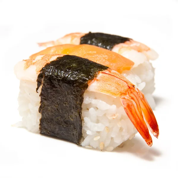 Holding sushi with chopsticks — Stock Photo, Image