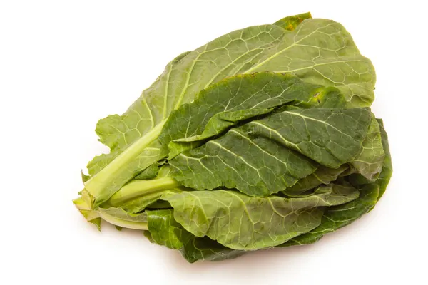 Spring Greens (Brassica oleracea ) isolated on a white studio ba — Stock Photo, Image