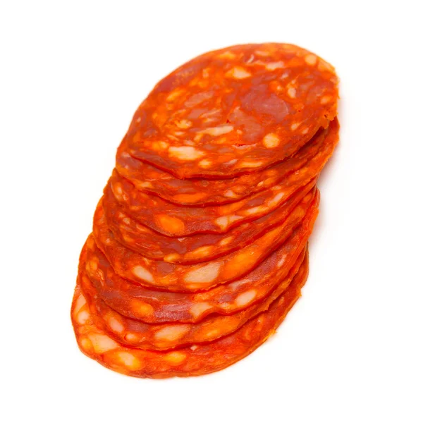 Affettato salsiccia chorizo isolato su uno sfondo bianco studio . — Foto Stock