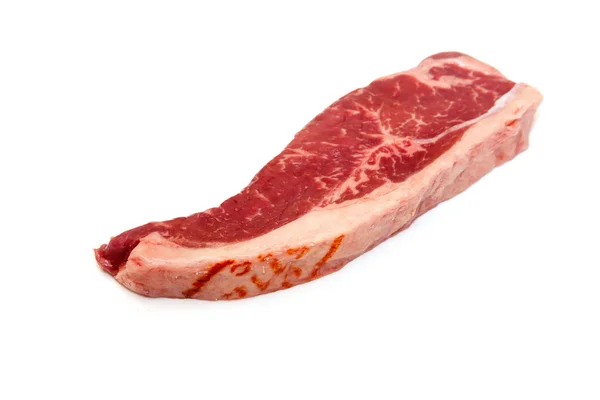 Sığır filetosu biftek izole bir arka planda beyaz studio. — Stok fotoğraf