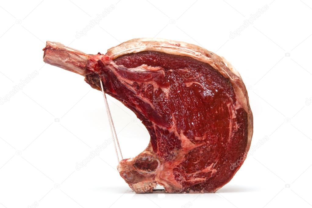 Rib of beef joint isolated on a white background.