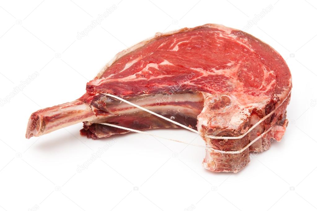 Rib of beef joint isolated on a white background.