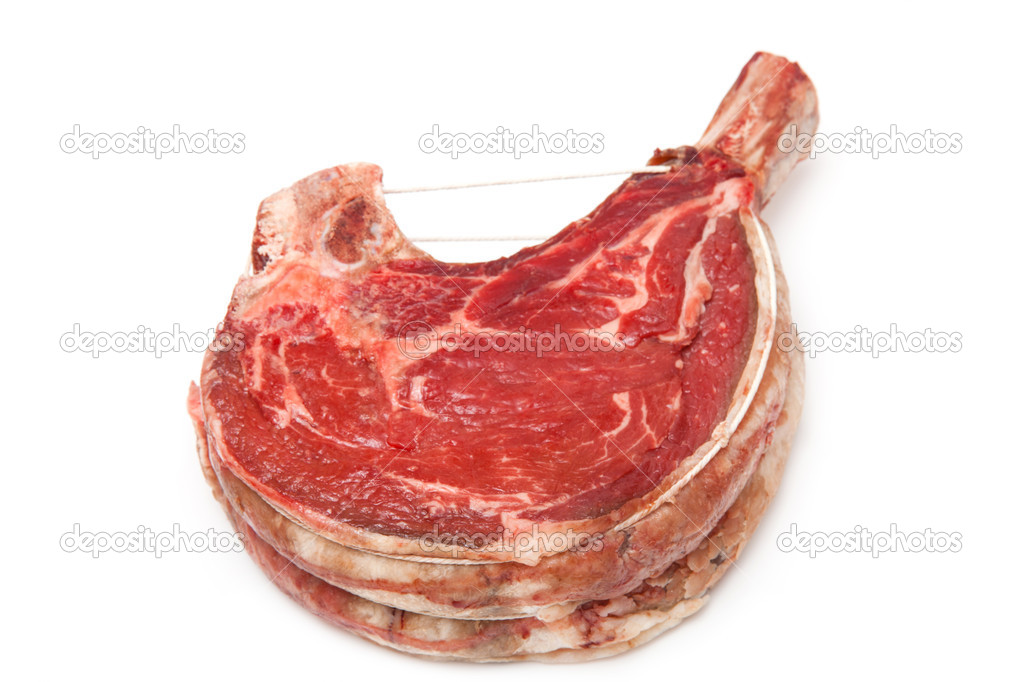 Rib of beef joint isolated on a white background.