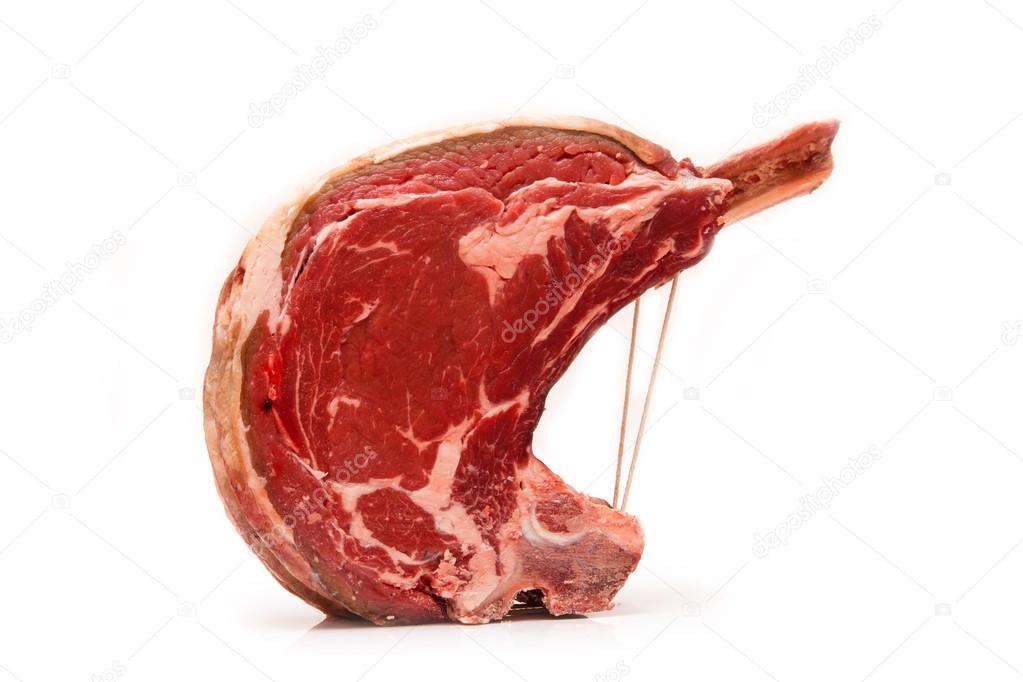 Rib of beef joint isolated on a white background.