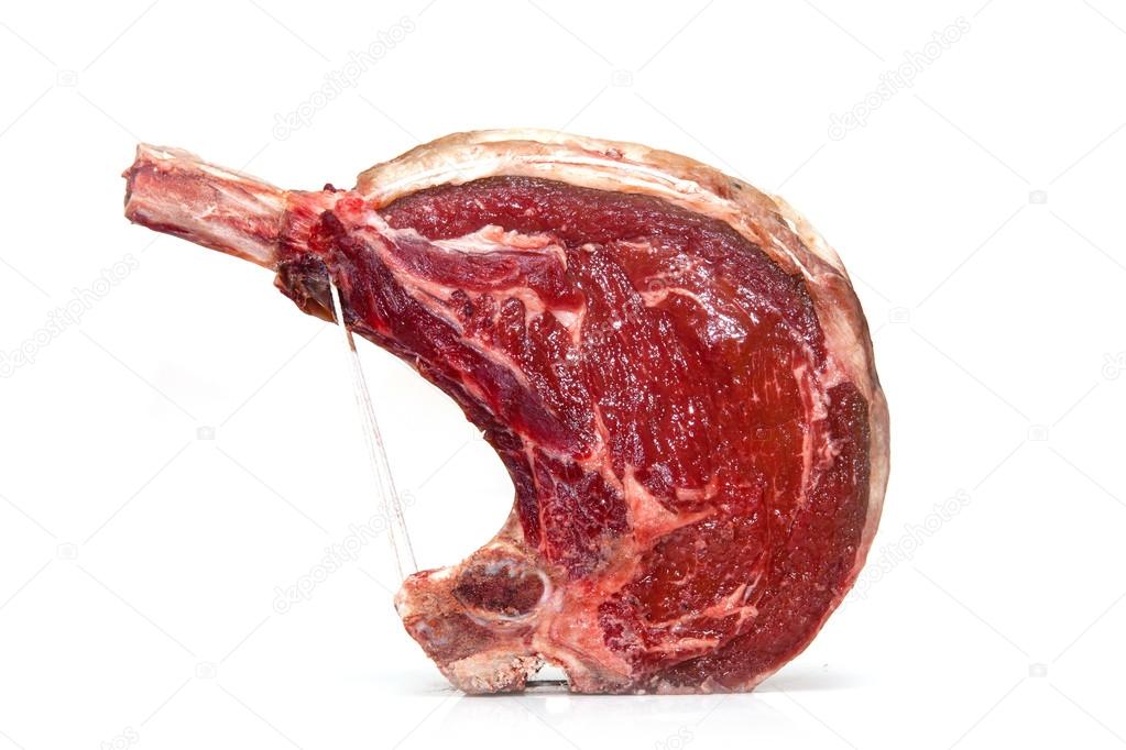 Rib of beef joint isolated on a white background.