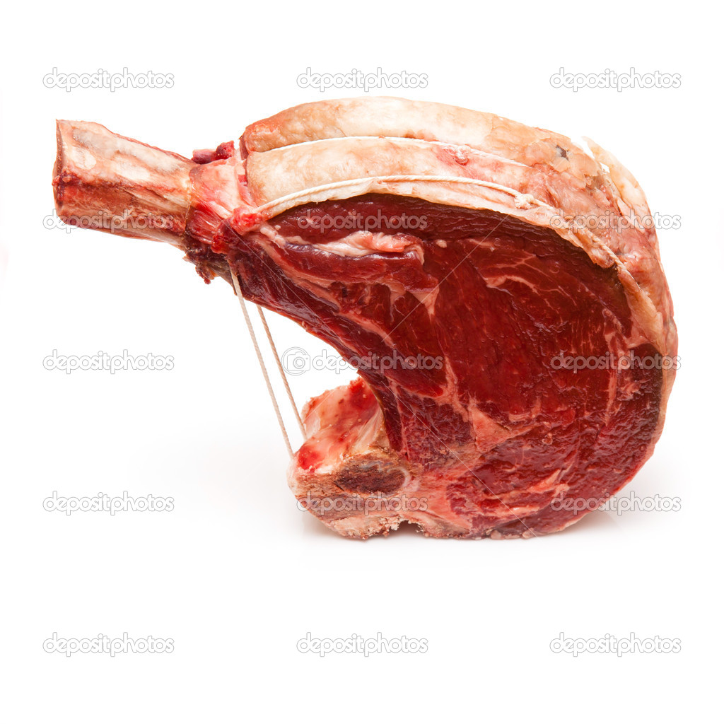 Rib of beef joint isolated on a white background.